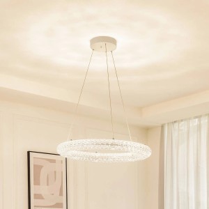 Moderne, transparente LED Pendelleuchte Tumata mit Dimmfunktion für Wohnzimmer.