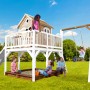 Axi Liam Spielhaus mit Schaukel und Rutsche in Braun-Weiß, mit spielenden Kindern im Garten.