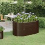 Braunes Furnicato Hochbeet aus verzinktem Stahl mit blühenden Pflanzen im Garten.