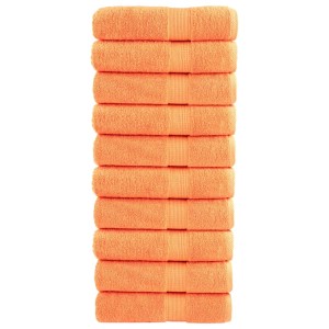 Stapel orangefarbene Premium-Handtücher, 10 Stück, 50x100 cm, 600 g/m², 100% Baumwolle.