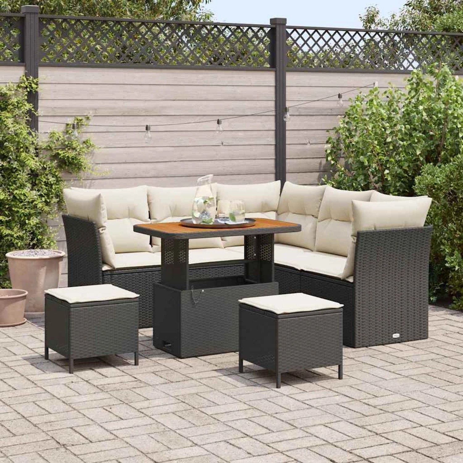 8-teiliges Garten-Sofa-Set aus Poly Rattan und Akazie in Schwarz mit Kissen.