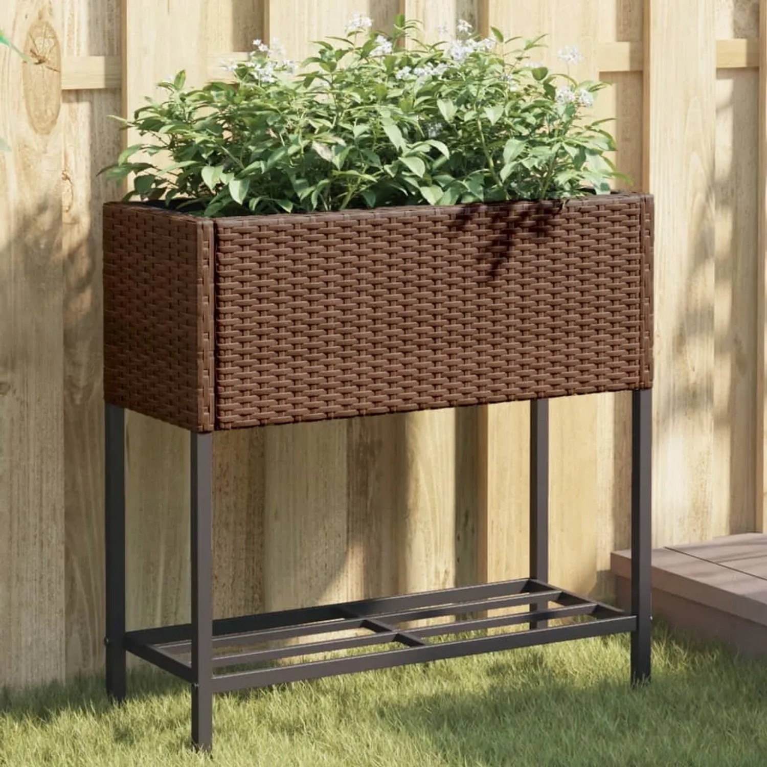 Brauner vidaXL Pflanzkübel mit Ablage aus Poly Rattan für Garten oder Terrasse.