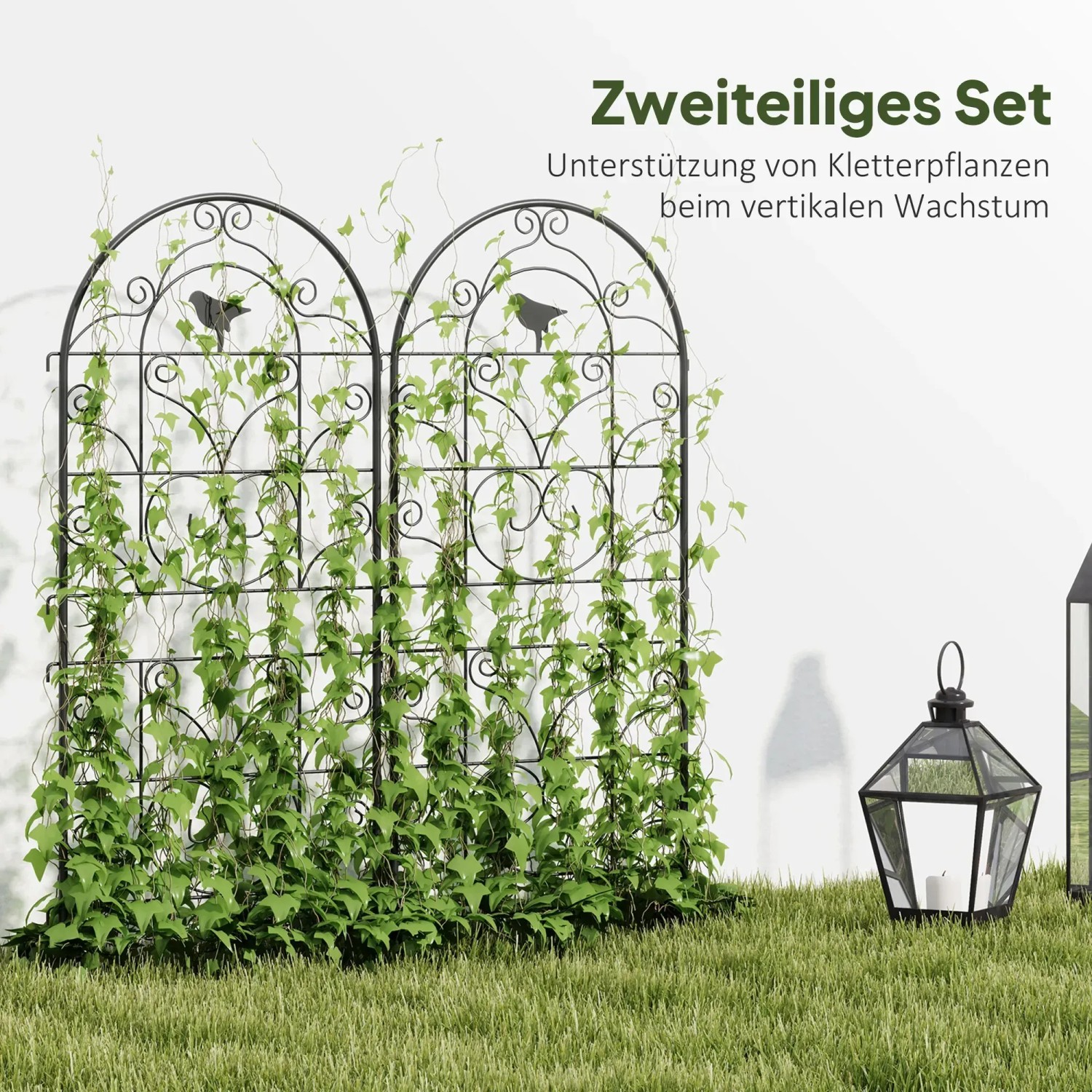 Outsunny Rankgitter 2er Set aus Metall, schwarz, mit Kletterpflanzen bewachsen.