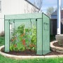 Grünes begehbares Foliengewächshaus mit Schrägdach, Rolltür und Tomatenpflanzen. Wetterfestes Tomatenhaus für Garten.