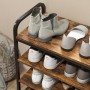 HOMCOM Schuhregal aus Spanplatte und Metall, braun, mit Schuhen. Schuhkommode mit 4 Ablagen.