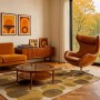 Lola&Moi Teppich Mountain Trail Gold, 80x150 cm, mit Kreismuster in Goldtönen im Wohnzimmer.