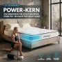 Arensberger Taschenfederkernmatratze Lena 140x200 cm im Schlafzimmer mit Sportlerin.
