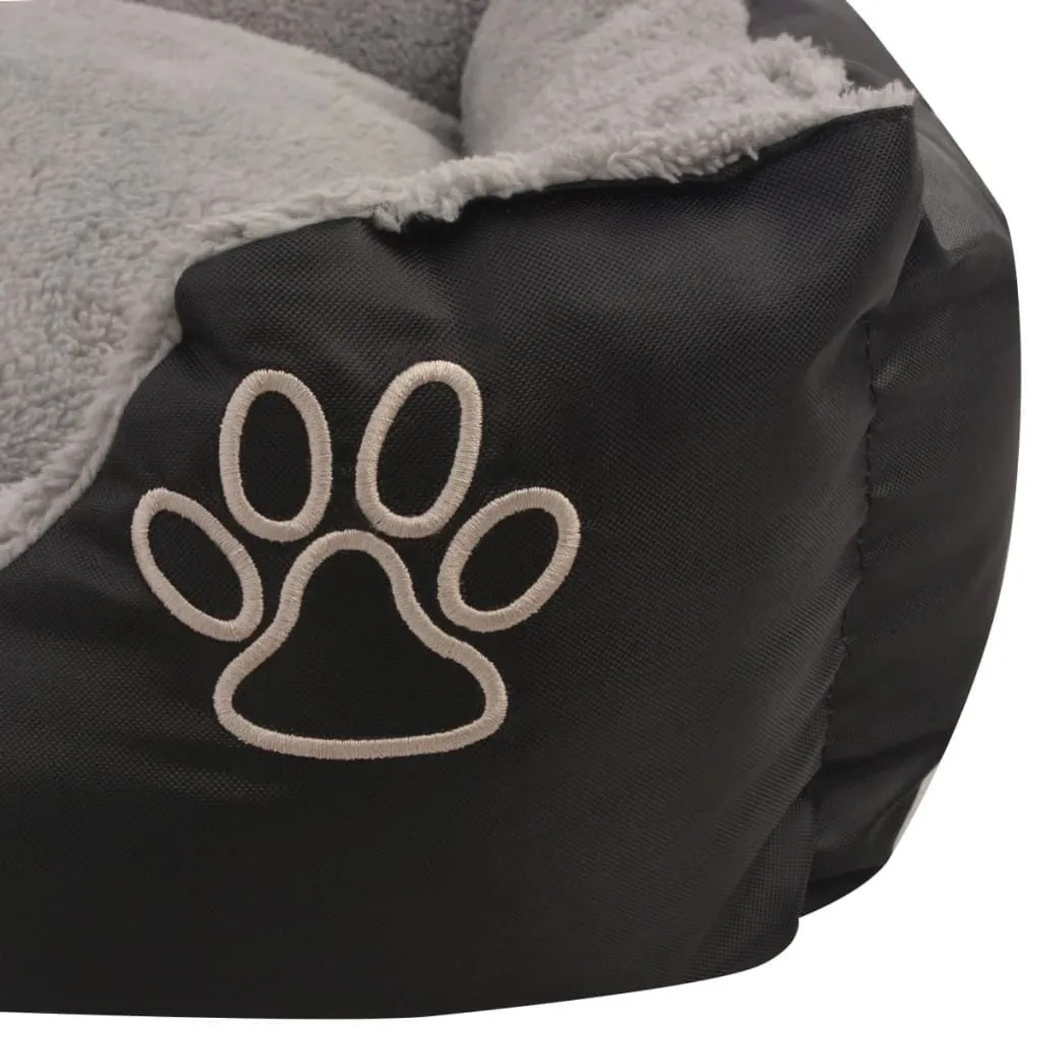 Schwarzes vidaXL Hundebett XL mit Pfoten-Motiv und grauem Kissen.