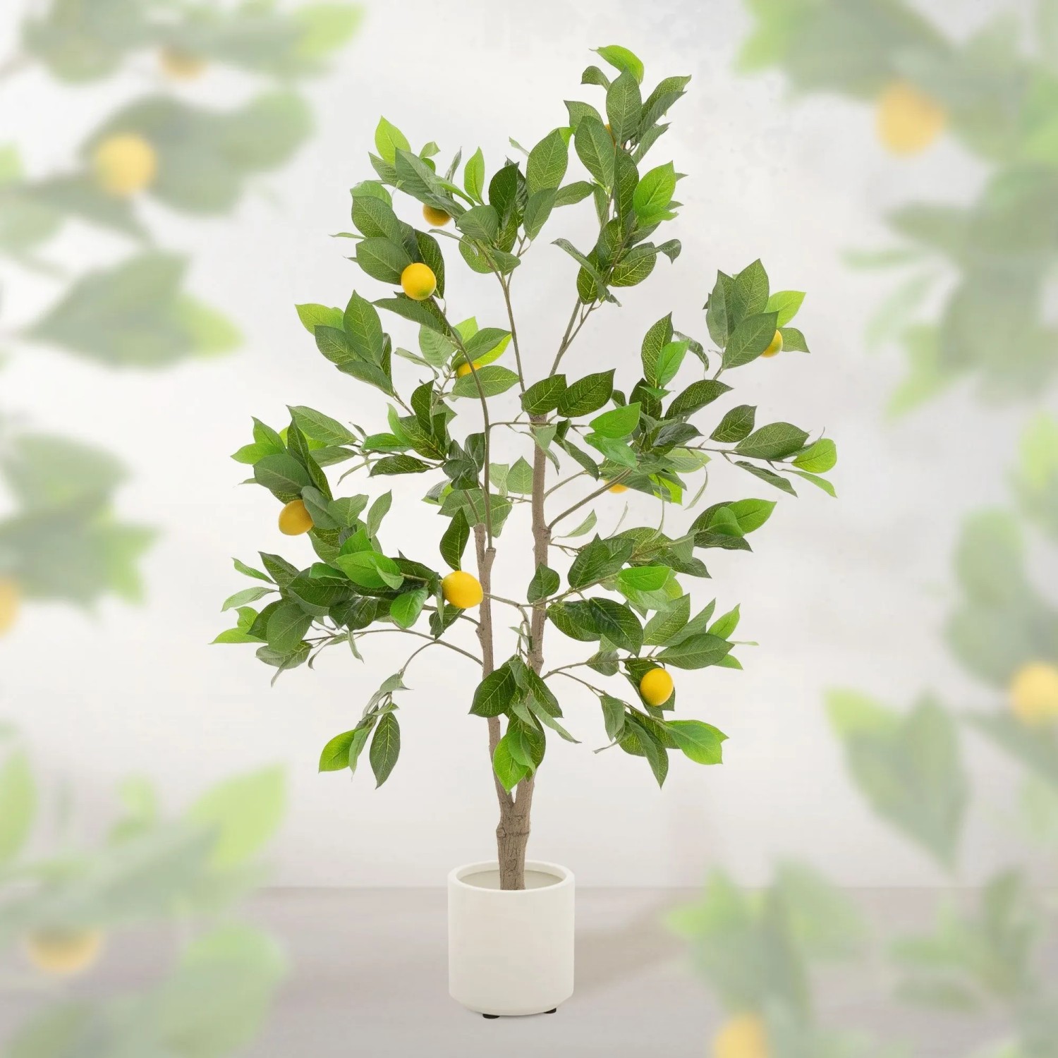 Künstlicher Zitronenbaum 130 cm hoch mit grünen Blättern und gelben Früchten in weißem Topf. Ideal als Dekoration.