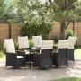 Schwarze 7-teilige Garten Essgruppe aus Polyrattan mit Tisch und Stühlen inklusive Kissen.