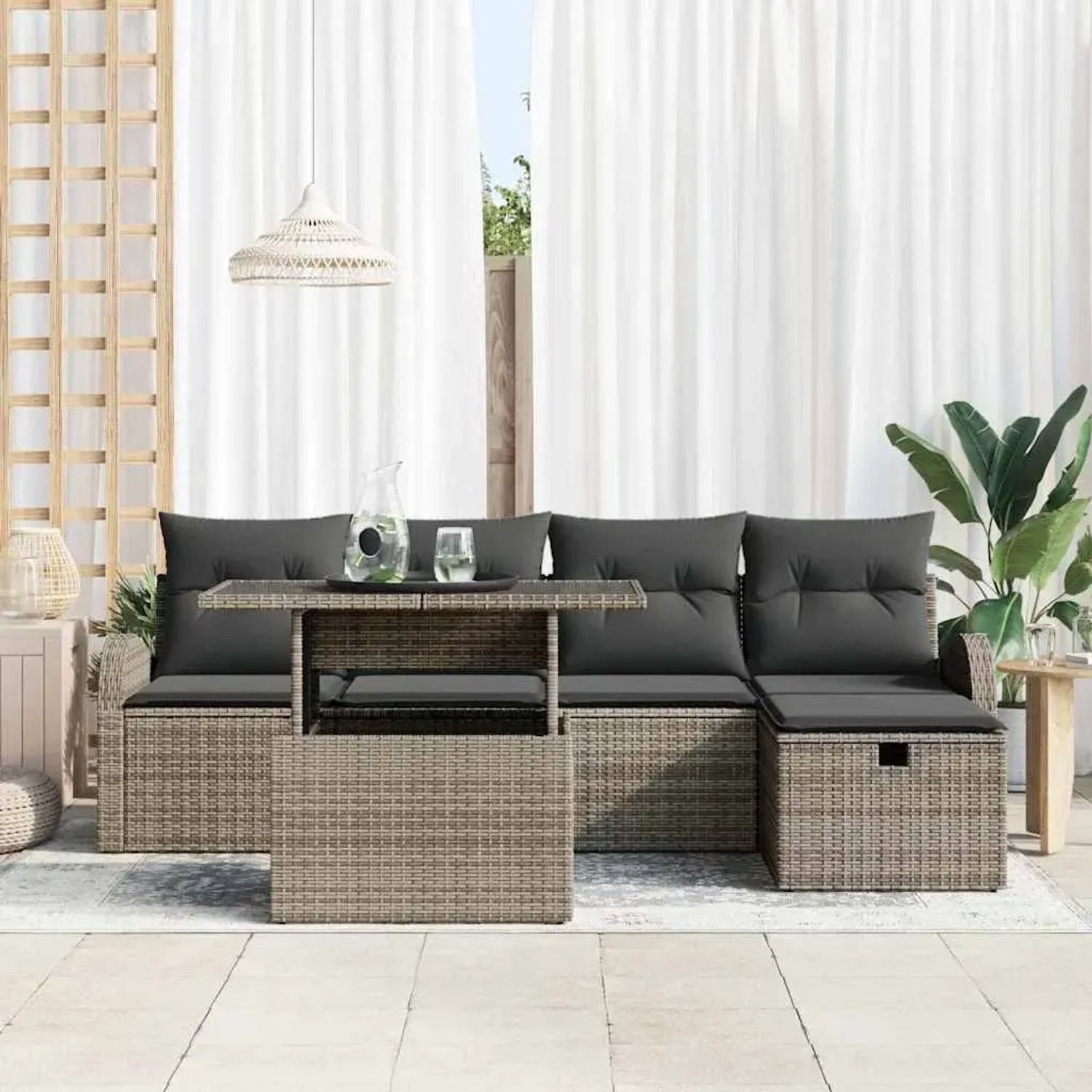 Graues 6-teiliges vidaXL Garten-Sofa-Set aus Poly Rattan mit Kissen und Stauraum.