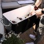 Schwarzer Axi Kühlwagen Retro (76 l) mit Eis und Getränken, ideal für Partys und BBQs.