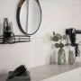 Schwarzer Wenko Haartrocknerhalter Milazzo Vacuum-Loc im modernen Badezimmer.