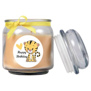 Gelbe Vanille Duftkerze im Bonbonglas mit Tiger-Motiv und Schleife.