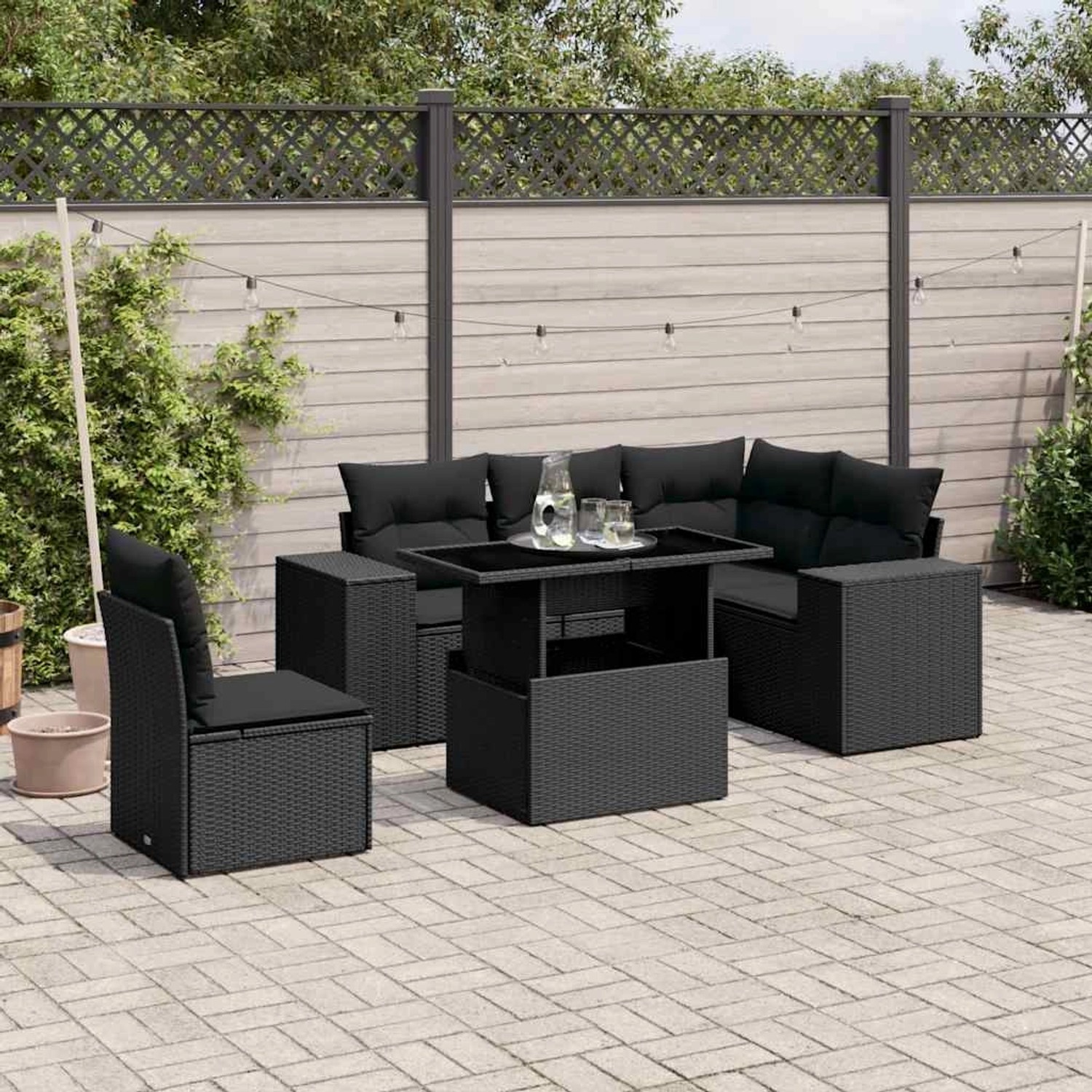 Schwarze 6-tlg. vidaXL Garten-Sofagarnitur aus Poly Rattan mit Tisch und Kissen.