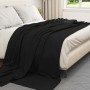 Schwarze vidaXL Wohndecke (6er-Set) aus Fleece, 240x220 cm, auf einem Bett.