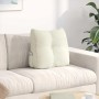 Cremefarbenes Samt-Rückenkissen auf Sofa, mit Knopfdesign und praktischer Seitentasche. Ideal für Komfort und Unterstützung.
