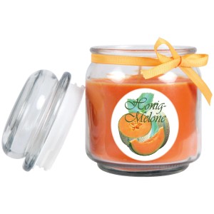 Duftkerze Honigmelone im Glas (Ø9cm) mit Schleife und geöffnetem Deckel.