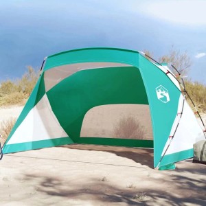 Meergrünes Furnicato Strandzelt mit weißen Akzenten auf Sandstrand. Bietet Sonnenschutz und Belüftung für Camping.