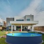 Runder Summer Fun Stahlwandpool 300x120cm, anthrazit, mit blauer Folie im Garten.
