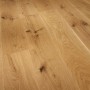 Parkettmuster Basic Rustikal Eiche Landhausdiele, Detailansicht der Holzstruktur mit Astlöchern.
