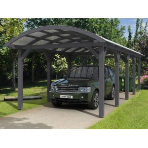 Skan Holz Carport Franken, schiefergrau, mit gebogenem Dach und Auto.