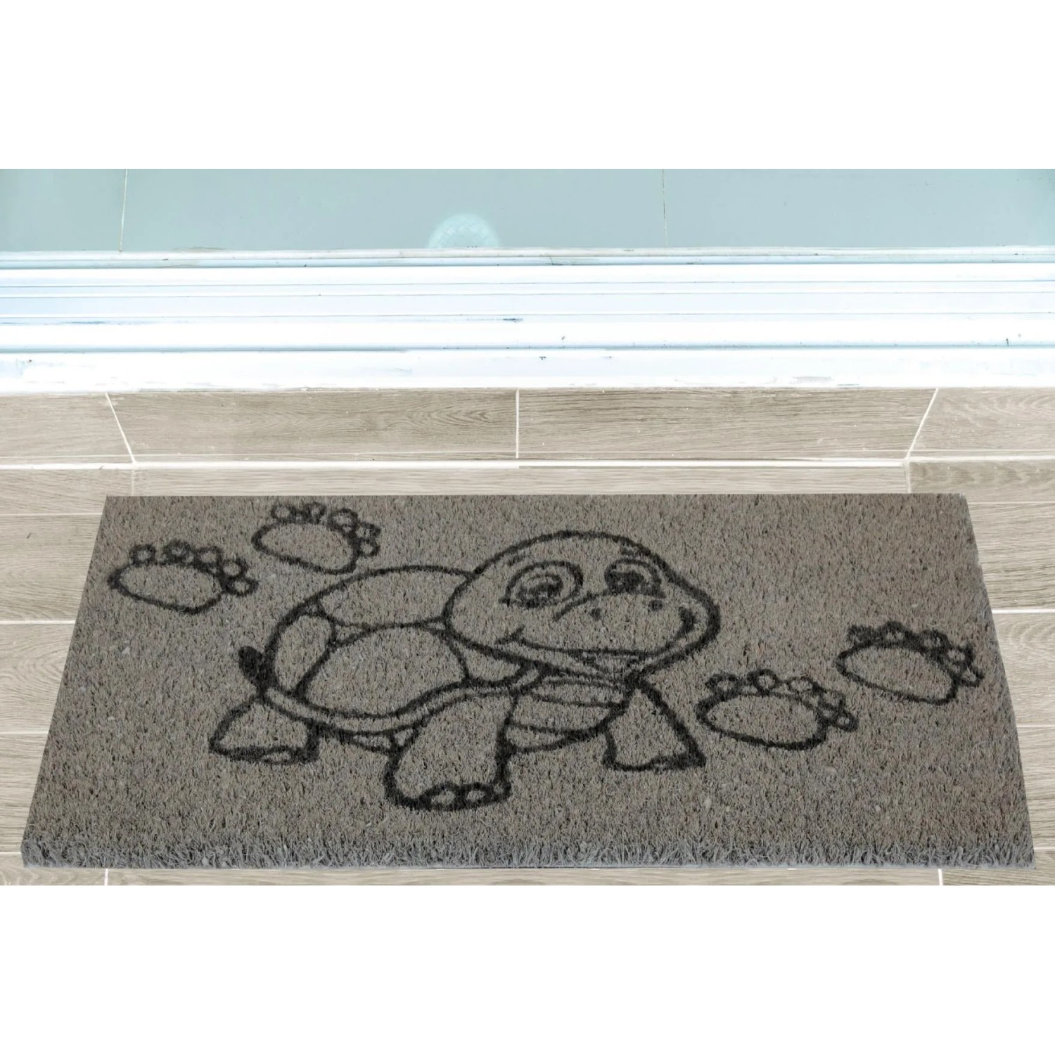 Graue Bestlivings Kokos Fußmatte mit Schildkröten-Motiv, 25x50 cm. Schmutzfangmatte für Innen und Außen.