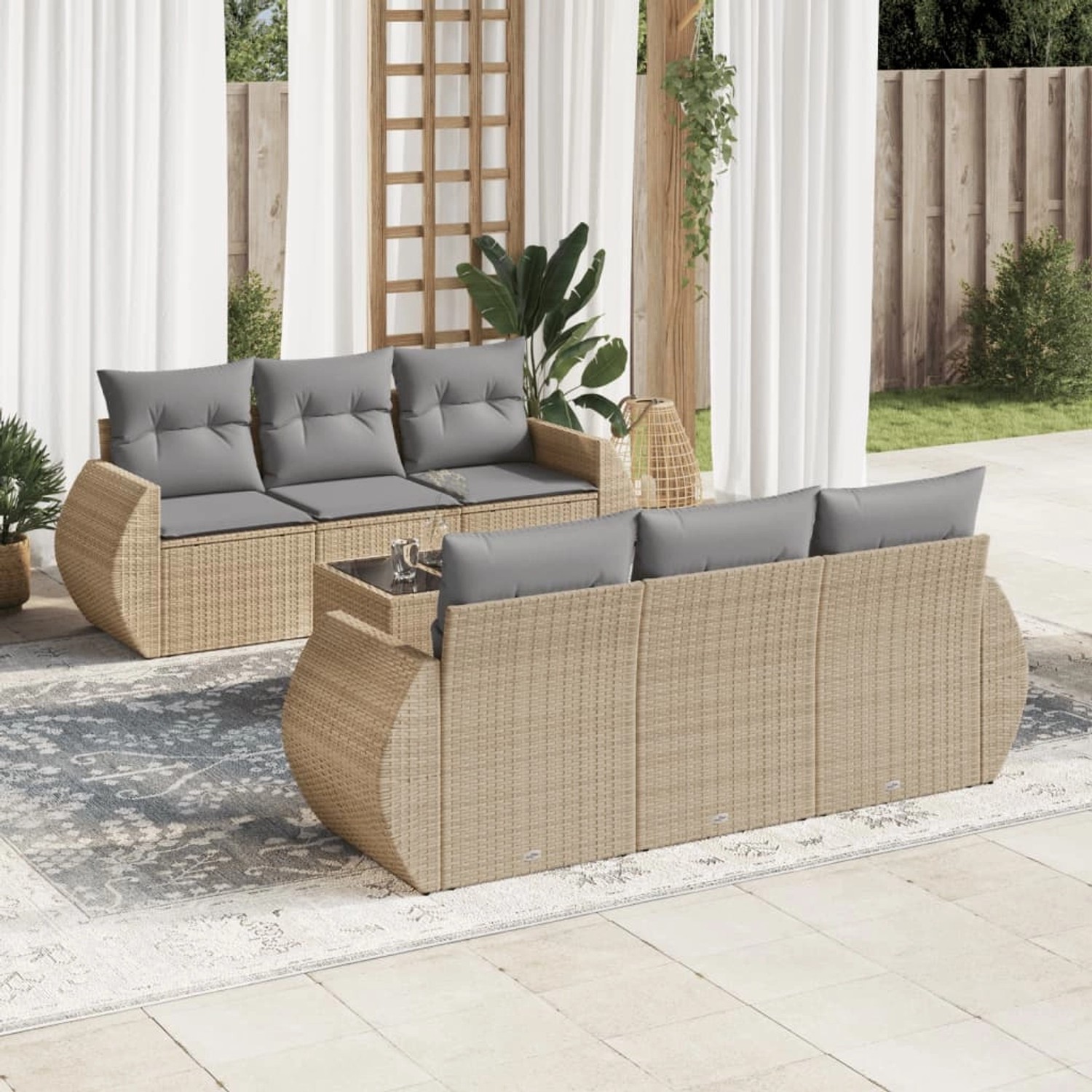 Beige 7-tlg. vidaXL Garten-Sofagarnitur aus Rattan mit grauen Kissen auf Terrasse.