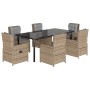 7-teilige Garten Essgruppe aus Rattan mit schwarzen Tisch und beigen Stühlen mit Kissen.