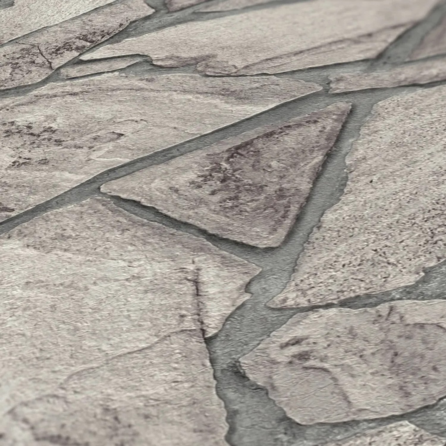 Graue A.S. Création Vliestapete mit detailgetreuer Bruchsteinmauer-Optik für Innenräume.