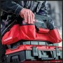 Einhell E-Case Systemkoffer Tasche, rot und schwarz, auf Werkzeugkoffer gestapelt.