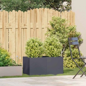 Anthrazitfarbener Pflanzkübel aus kaltgewalztem Stahl, 80x40x40 cm, mit grünen Pflanzen auf Terrasse.