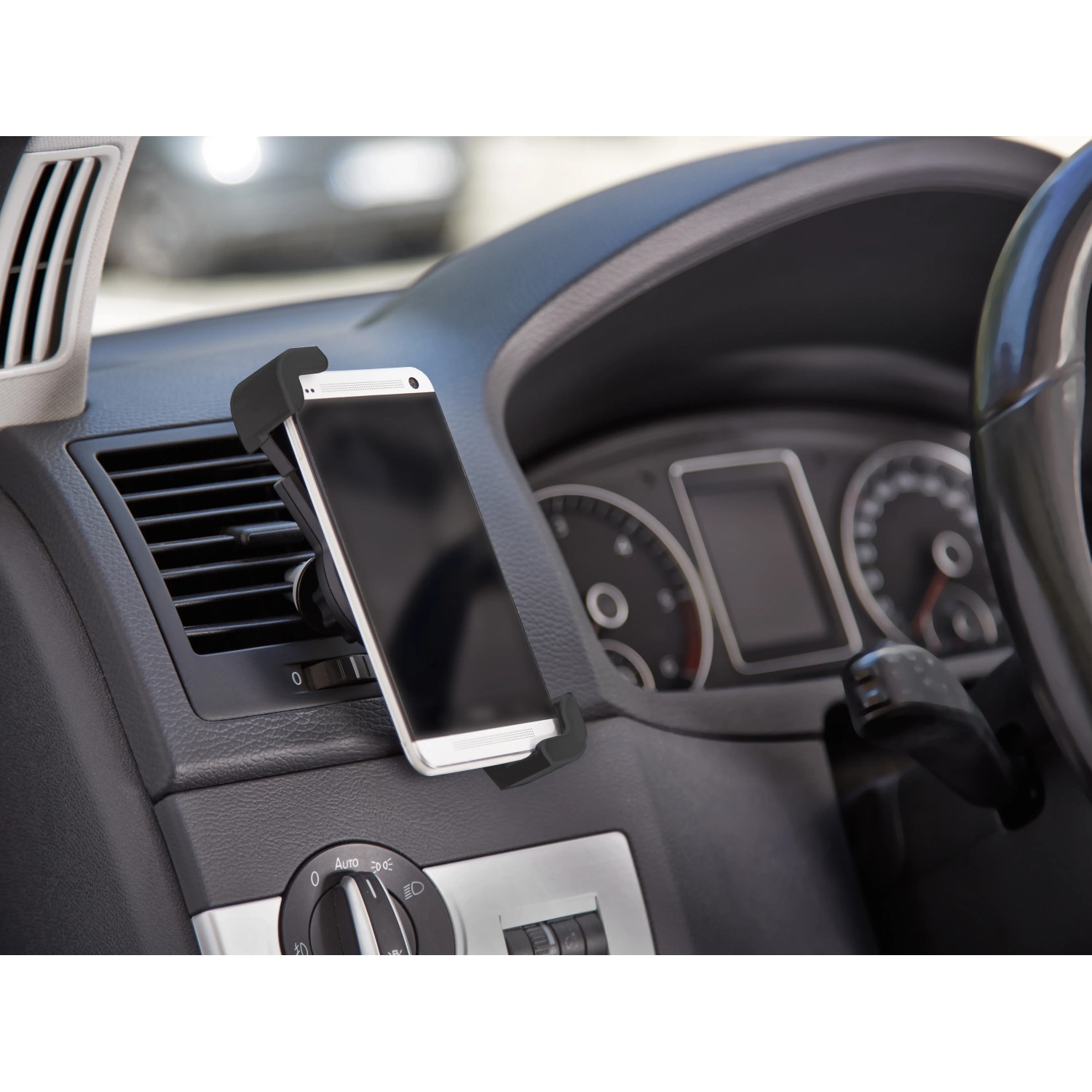 OBI Kfz Smartphone Halterung am Lüftungsschlitz mit Handy in Schwarz-Grau.