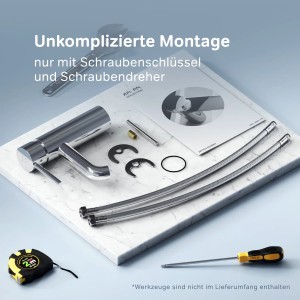 AM.PM Spike Waschtischarmatur Chrom, Einzelteile und Montageanleitung auf Marmorplatte.