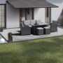 Terrasse mit Betonplatten Mailand weiß-schwarz (40x40) und Gartenmöbeln unter Markise.