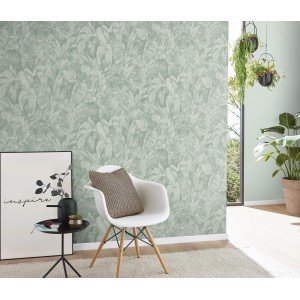 Erismann Vliestapete Play of Light Deliciosa Grün mit Blätter-Motiv im Wohnraum.