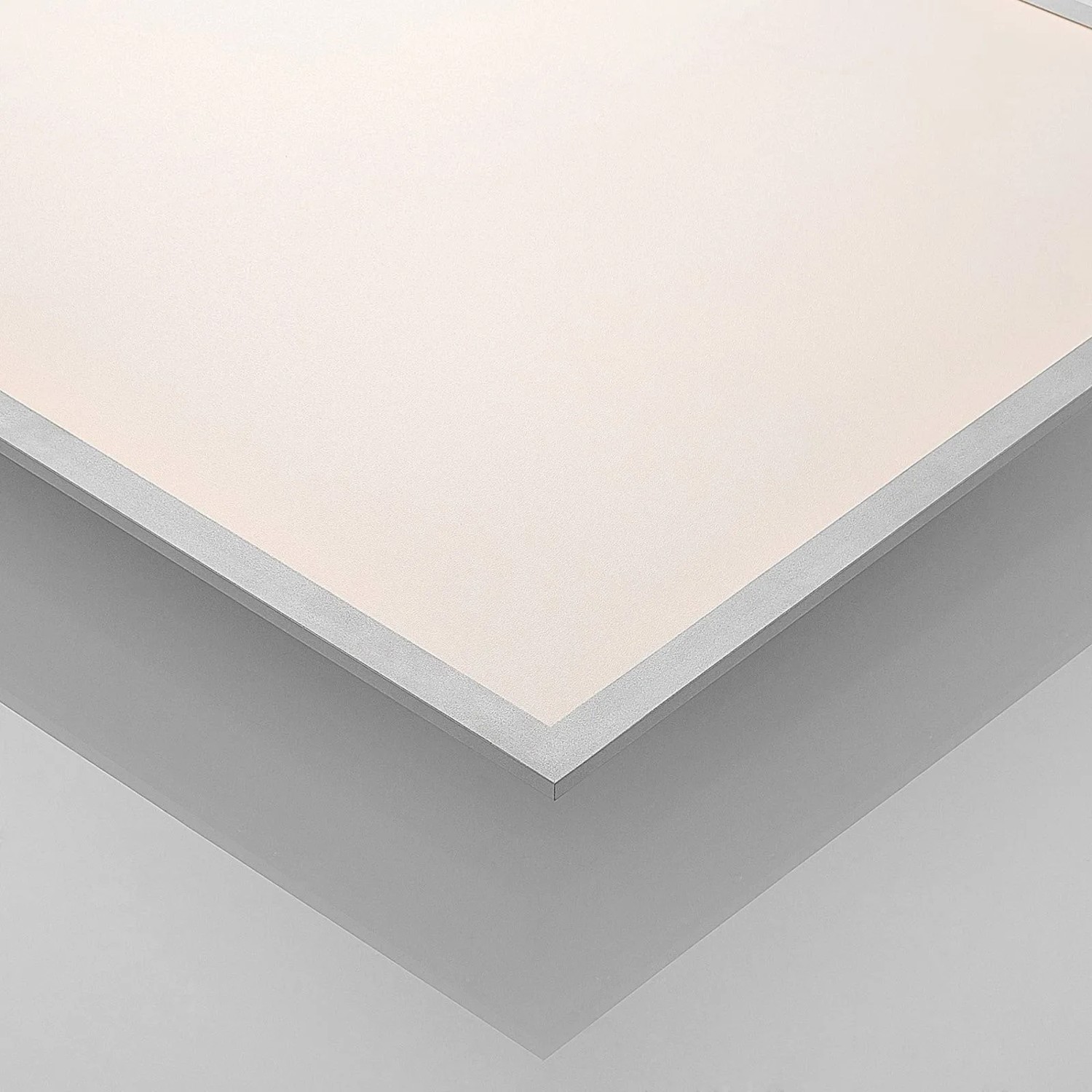 Weißes, dimmbares Lindby LED Panel Stenley aus Kunststoff mit schmalem Rahmen. Ideal als moderne Küchenleuchte.