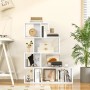 Weißes, modernes Costway Bücherregal (80x22x100 cm) mit 5 geometrischen Ebenen, gefüllt mit Büchern und Deko. Für Wohnzimmer.