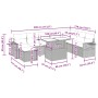 Schwarze 9-teilige Garten-Sofagarnitur aus Polyrattan mit Tisch, Hockern und cremefarbenen Kissen.
