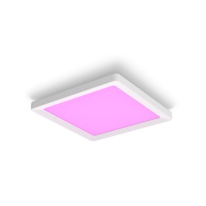 Quadratisches Philips Hue LED-Panel Tento in Weiß mit pinkfarbenem Licht.