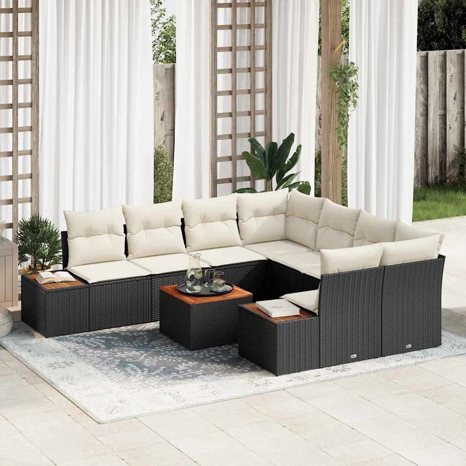 Schwarzes 9-teiliges vidaXL Garten-Sofa-Set aus Poly Rattan mit Kissen.