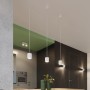 Drei weiße Sollux Lighting ORbis Hängeleuchten im modernen Wohnraum.