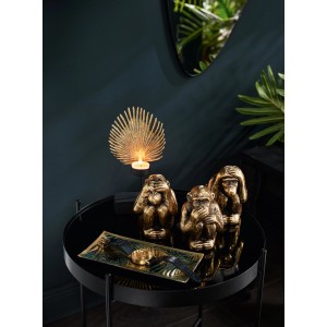 Dekorative Glasplatte Dark Wonder in Schwarz-Gold mit Blätterdesign auf einem Tisch mit Deko-Elementen.