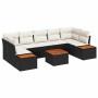 Schwarzes 8-teiliges Garten-Sofa-Set aus Poly Rattan mit Kissen und Tisch.