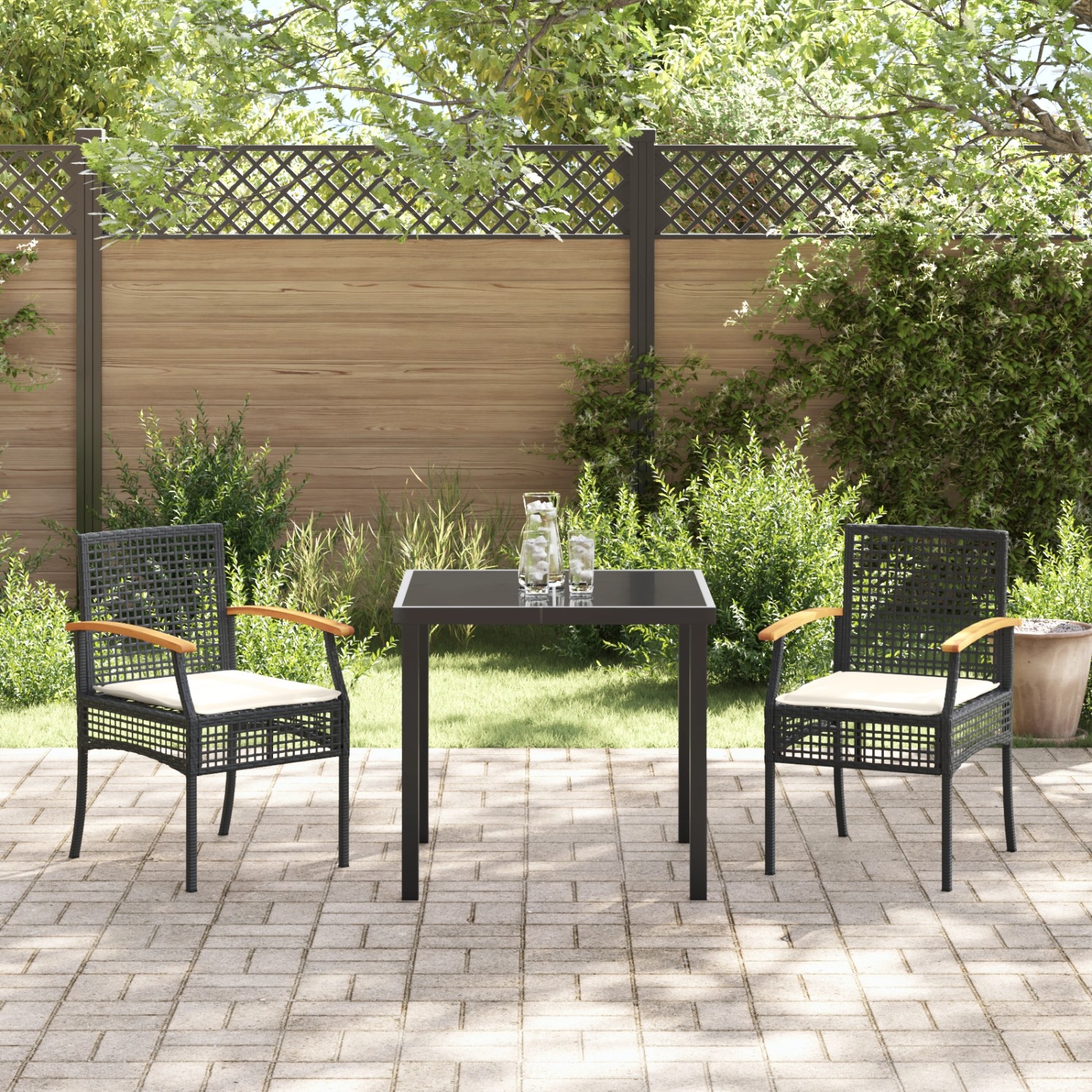 Schwarze 3-teilige Garten Essgruppe aus Poly Rattan von vidaXL mit Tisch und Stühlen.