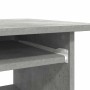 Detailansicht Schreibtisch Betongrau mit Ablage und Tastaturauszug.