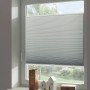 Weißes Schöner Wohnen Thermo-Wabenplissee Sina am Fenster, Plissee für Wärme- und Kälteschutz.