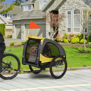 PawHut Hundeanhänger, gelb/grau, mit Hund im Inneren, befestigt an einem Fahrrad.