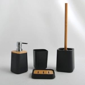 Schwarzes Bad-Set: WC-Bürste, Seifenspender, Becher und Seifenablage mit Bambus-Akzenten.