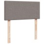 Boxspringbett Kopfteil in Taupe mit Holzfüßen. Stoffbezug.